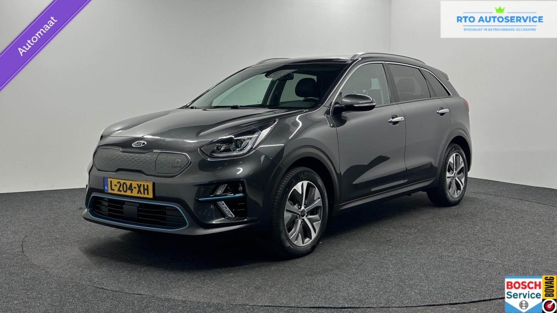 Kia e-Niro DynamicPlusLine 64 kWh CAMERA CARPLAY SCHUIF/KANT, Auto's, Gebruikt, Zwart, 1712 kg, Met garantie (alle)