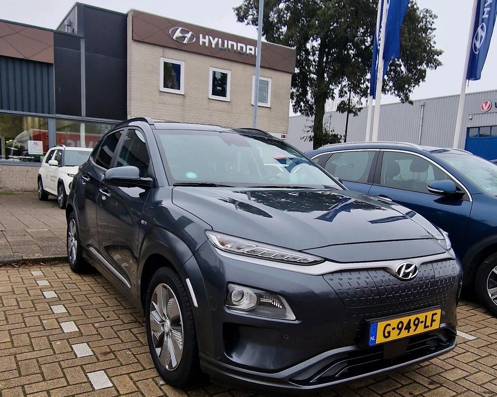 Hyundai Kona EV Premium 64kWh 2019 Grijs, Auto's, Hyundai, 14 kWh, 44 min, Elektrisch, Particulier