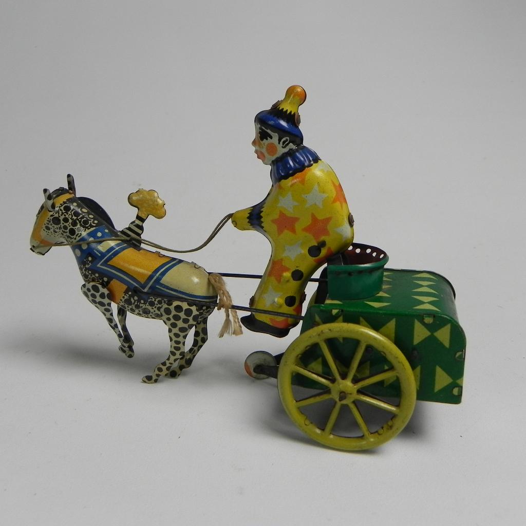 Blikken speelgoed clown op rijtuig met paard, Ophalen of Verzenden