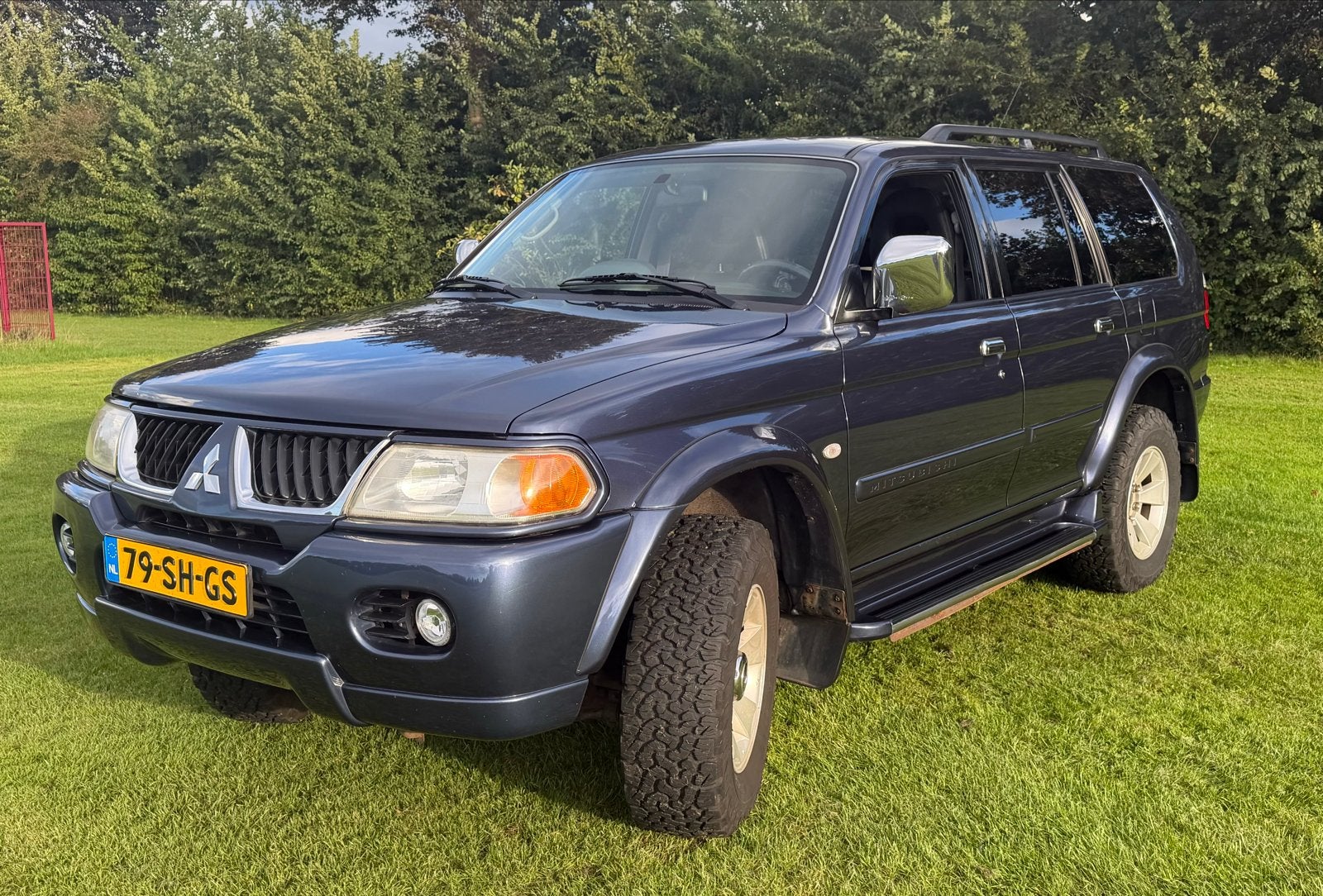 Mitsubishi Pajero Sport 3.0 V6 AUT 2006  Incl nieuwe APK, Auto's, Automaat, Zwart, Blauw, 2800 kg