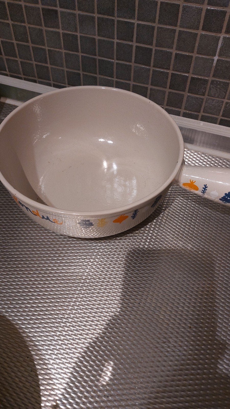 5  Le Creuset pannen, Ophalen