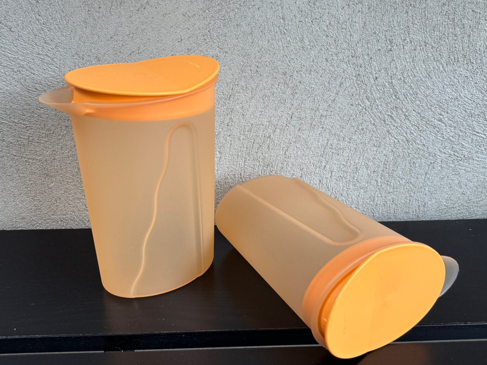 Tupperware trendy oranje kan 1 liter waterkan sapkan, Ophalen of Verzenden, Gebruikt, Oranje, Beker of Kan