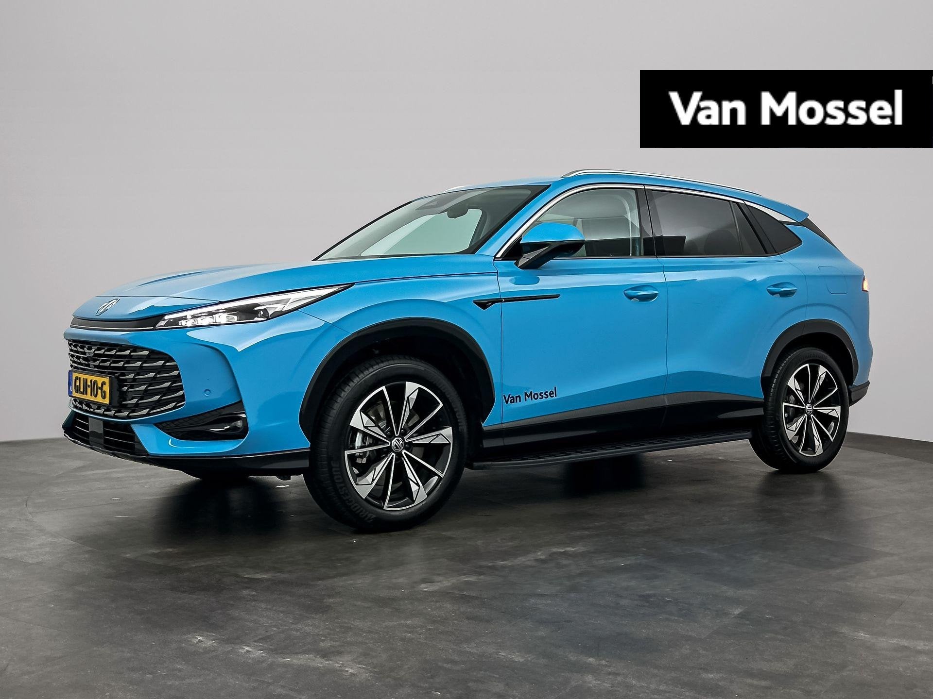 MG HS PHEV 1.5 272pk Aut. Luxury | 100km Electrisch | Navi |, Auto's, MG, 12 maanden, Stof, 4 cilinders, Blauw