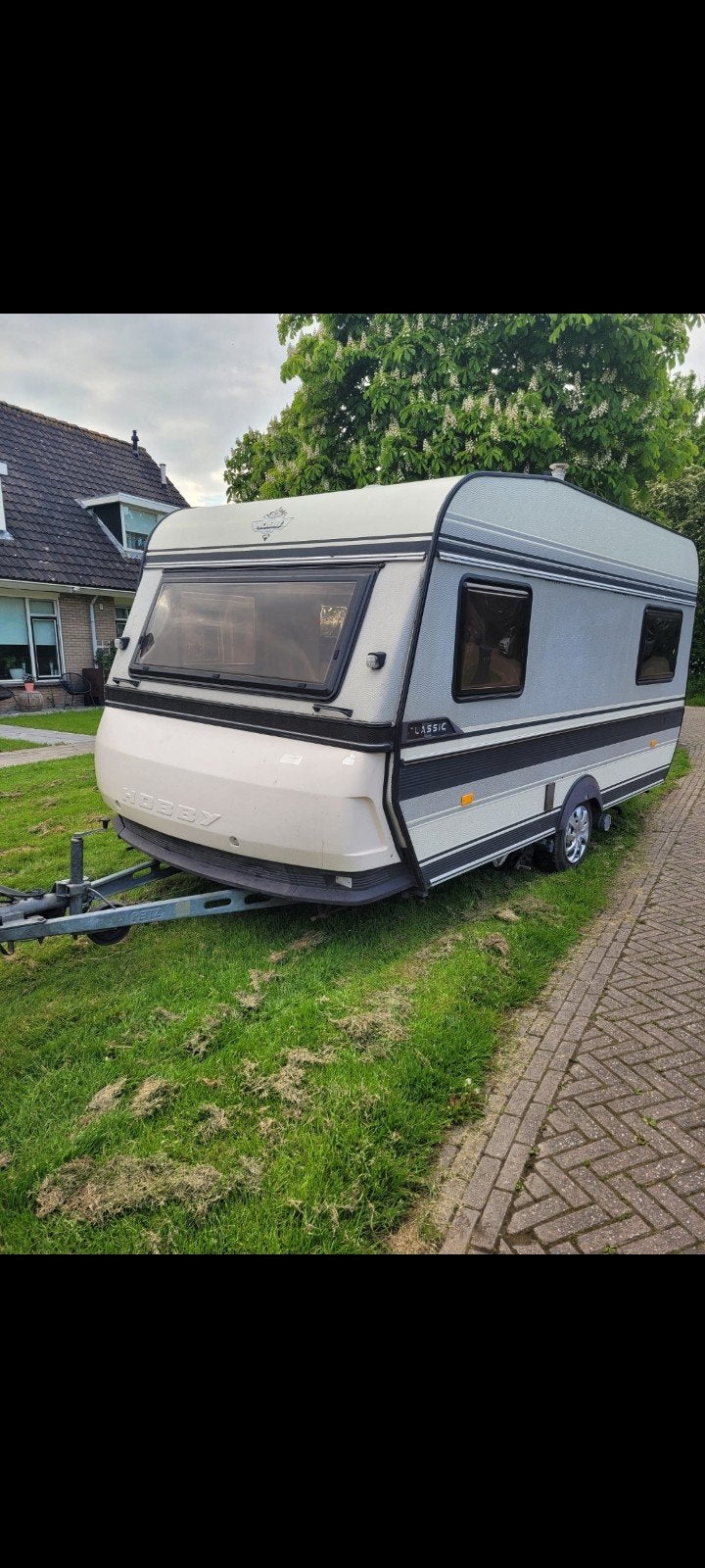 hobby 420 te koop inclusief  voortent, luifel en airco, Caravans en Kamperen, Vast bed, Hobby, Particulier, Disselslot