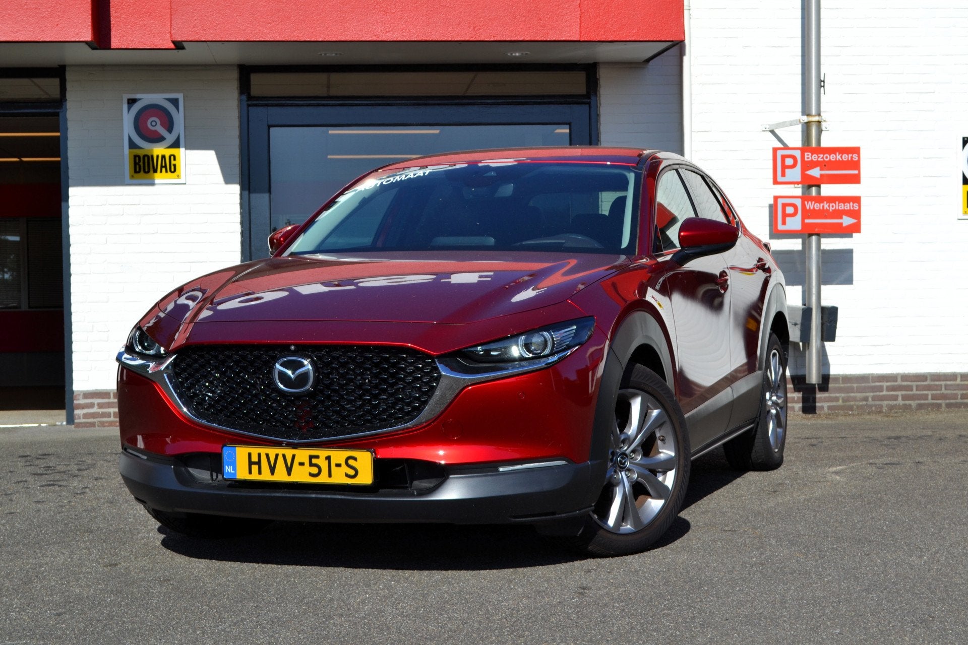 Mazda CX-30 2.0 e-SkyActiv-G M Hybrid Automaat, Navi Bose, L, Gebruikt, Zwart, 4 cilinders, Overige brandstoffen