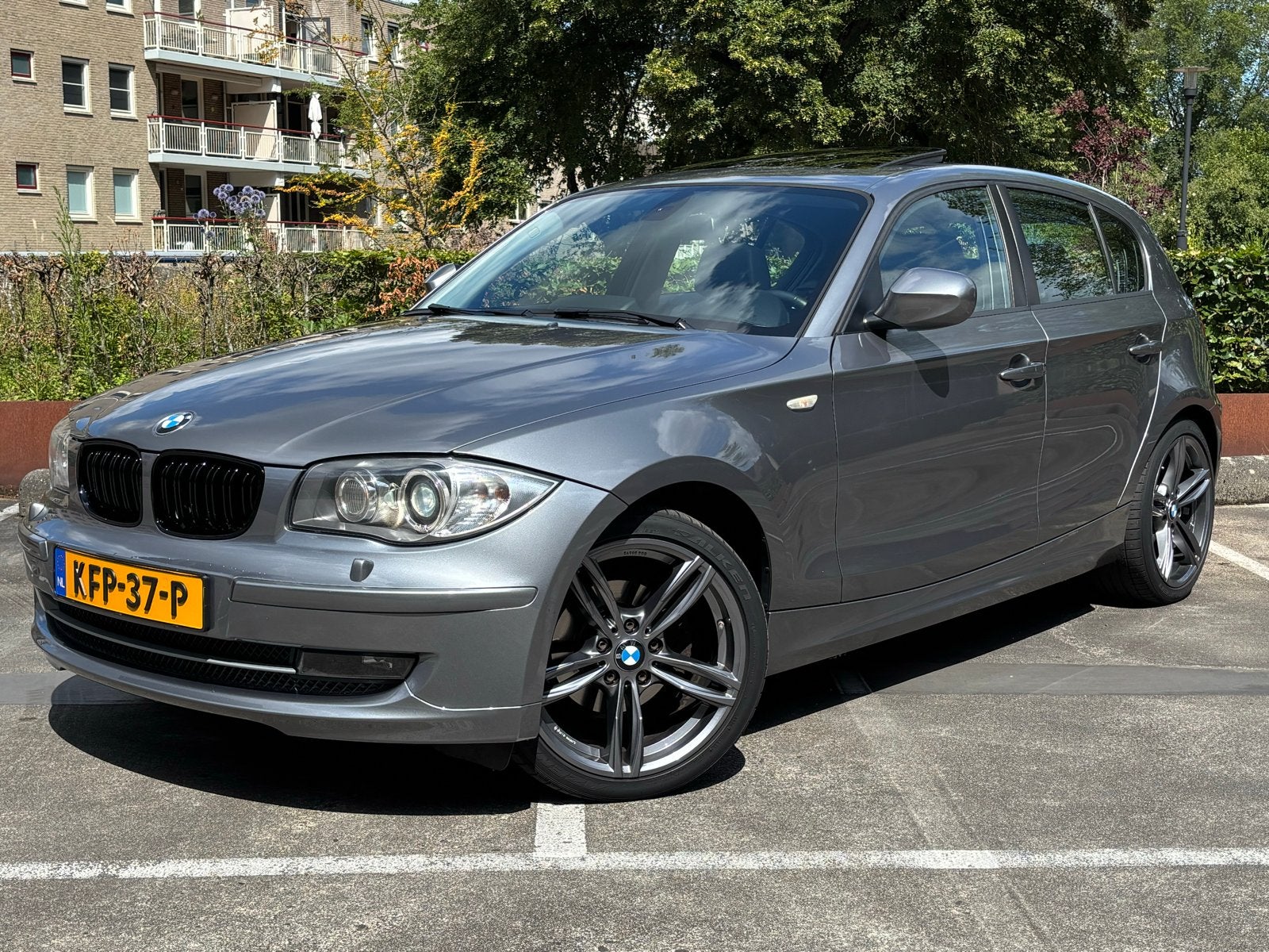BMW 1-Serie 118i Efficientdynamics Edition 143pk 2011, Auto's, BMW, Stof, 1995 cc, Zwart, 1200 kg