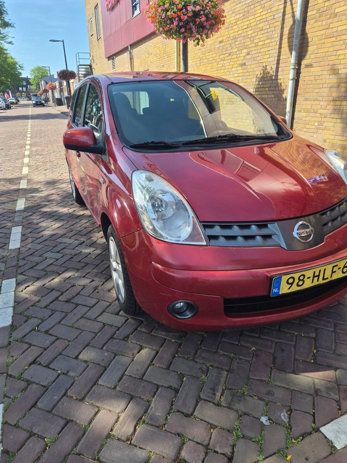 Nissan Note 1.6 16V 2009 Rood, Auto's, Nissan, Voorwielaandrijving, Euro 5, 40 €/maand, 4 cilinders