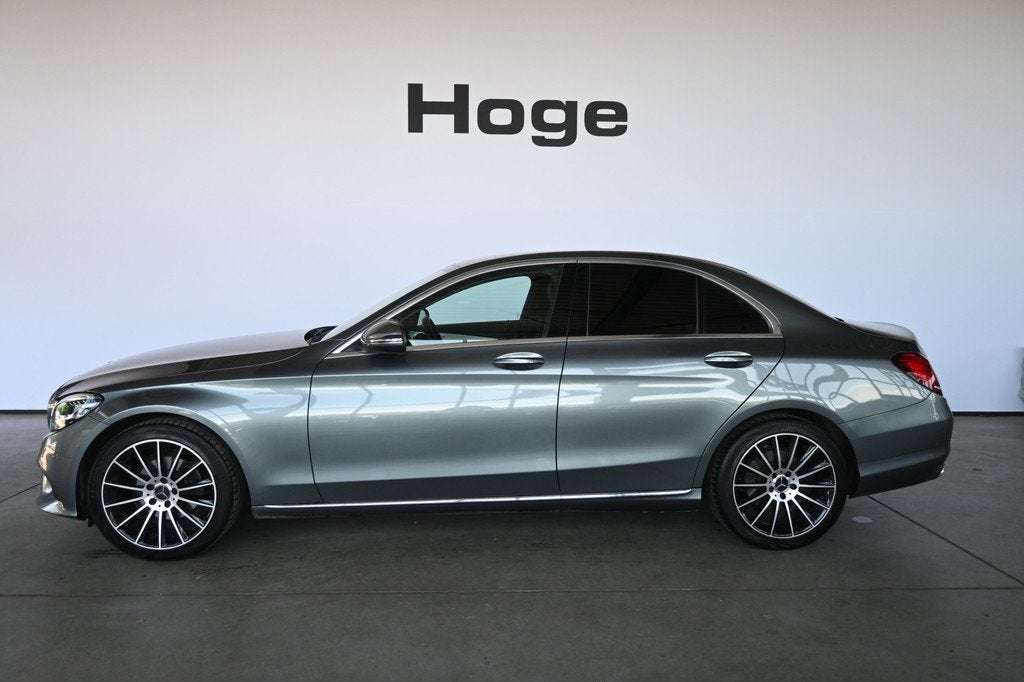 Mercedes-Benz C-Klasse 180 Premium Plus Pack AMG Line Naviga, Met garantie (alle), Leder en Stof, 1595 cc, Sedan