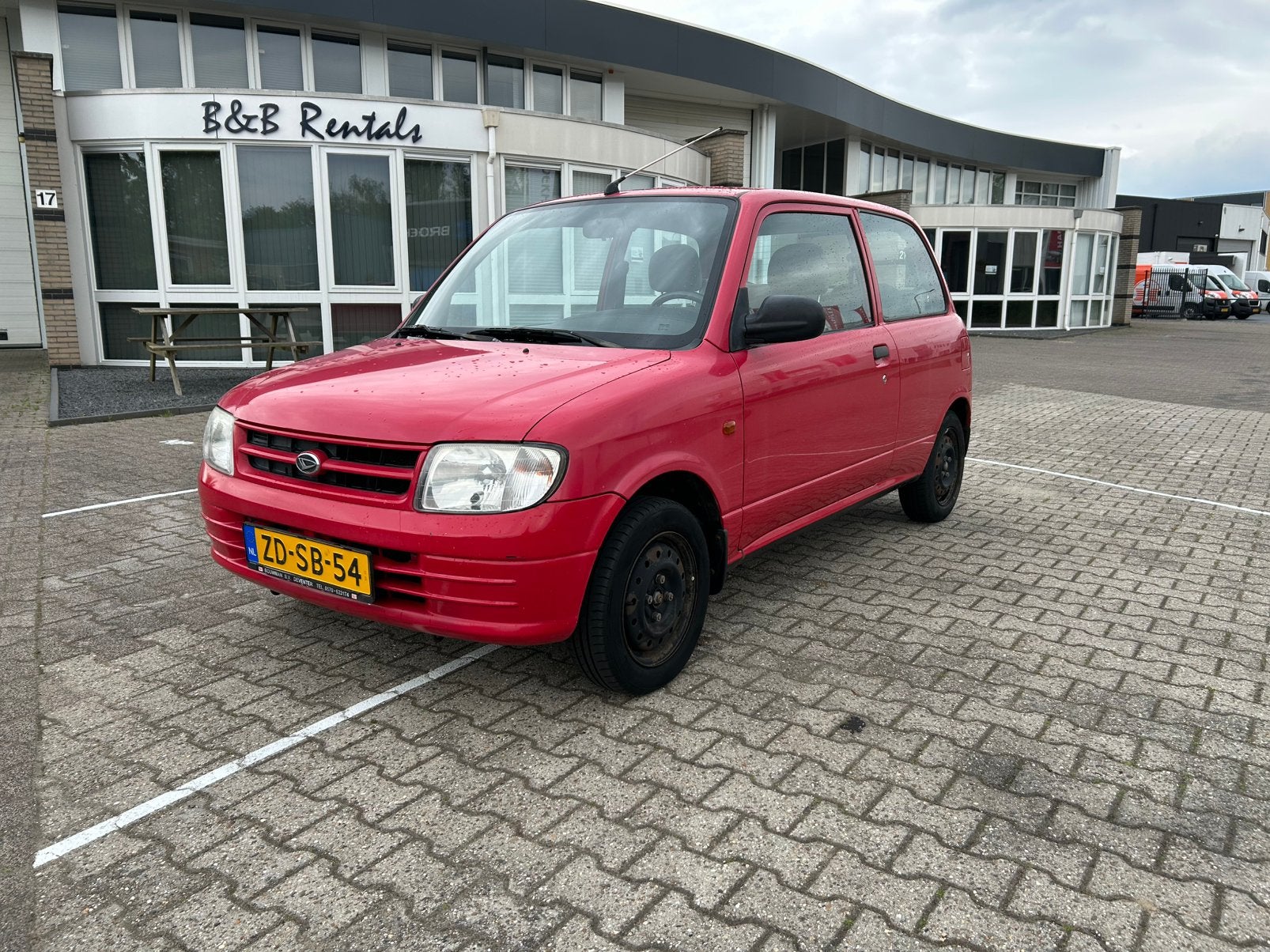 Daihatsu Cuore 1.0 40KW 1999 Rood, Voorwielaandrijving, Stof, 18 €/maand, 4 stoelen