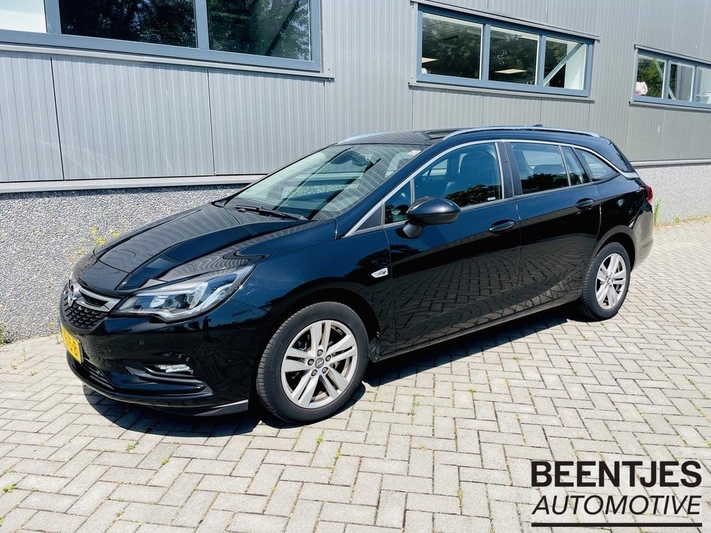Opel Astra Sports Tourer 1.4 Online Edition 150 pk | Trekhaa, Auto's, Voorwielaandrijving, Stof, Gebruikt, 4 cilinders