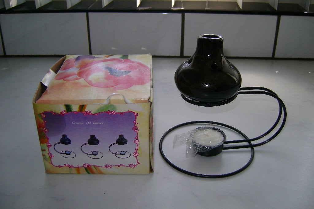 nieuw in verpakking aardewerk olie lampje met onder waxine, Antiek en Kunst, Ophalen of Verzenden