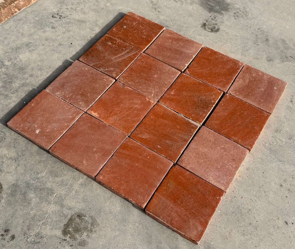 50m2 Terra cotta plavuizen 20x20x2.2cm + 43m1 plint tegels.