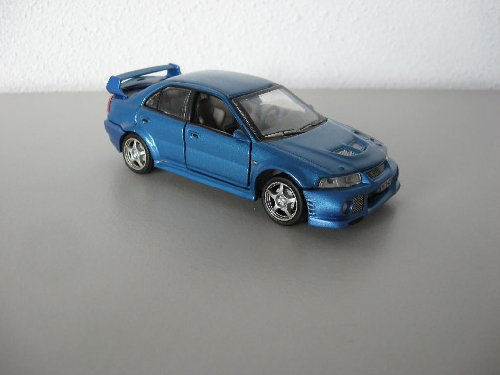 Mitsubishi Lancer EVO, Ophalen of Verzenden, Zo goed als nieuw, Auto, Overige merken