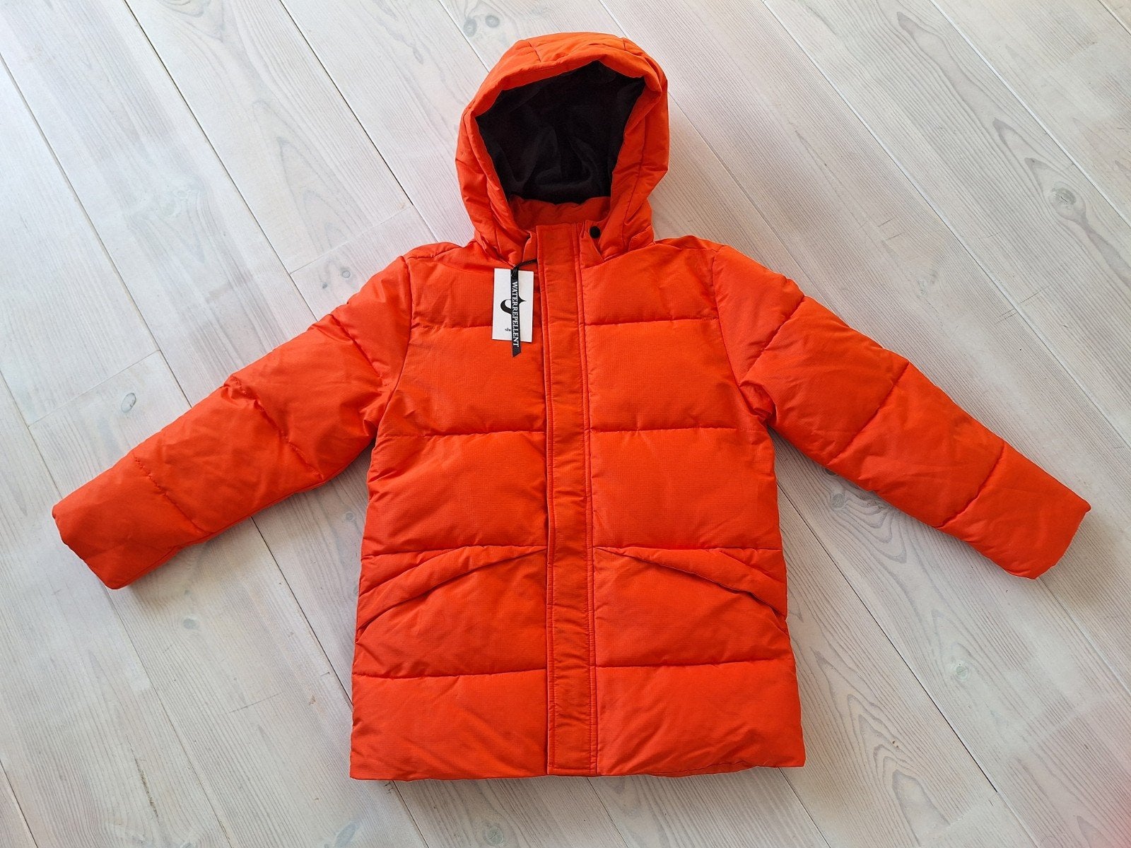 Nieuwe Oranje winterjas maat 158-164, Kinderen en Baby's, Ophalen of Verzenden