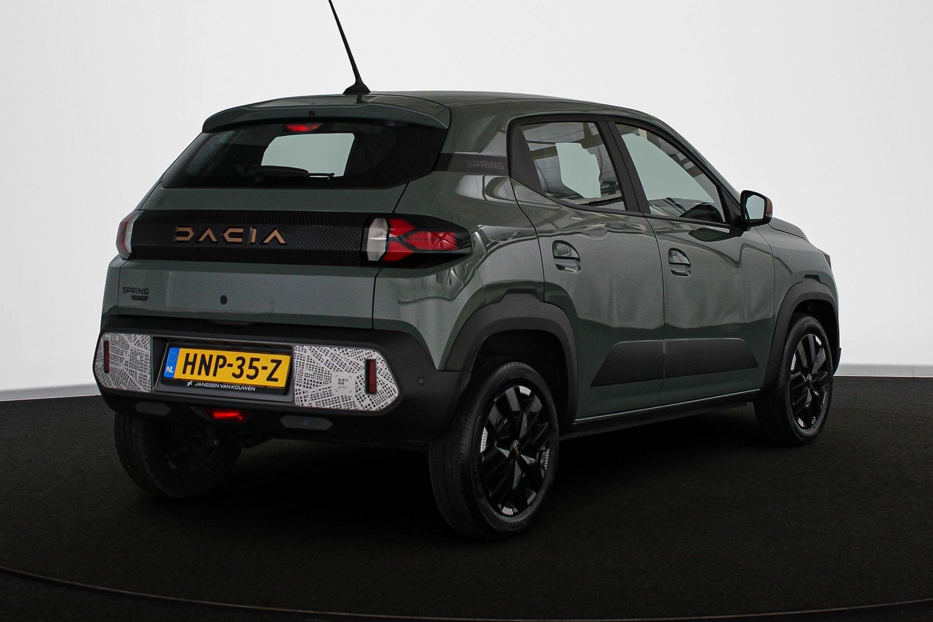 Dacia Spring Extreme 65 26.8 kWh Camera Apple CarPlay Airco, Auto's, Gebruikt, 4 stoelen, Leder en Stof, Origineel Nederlands
