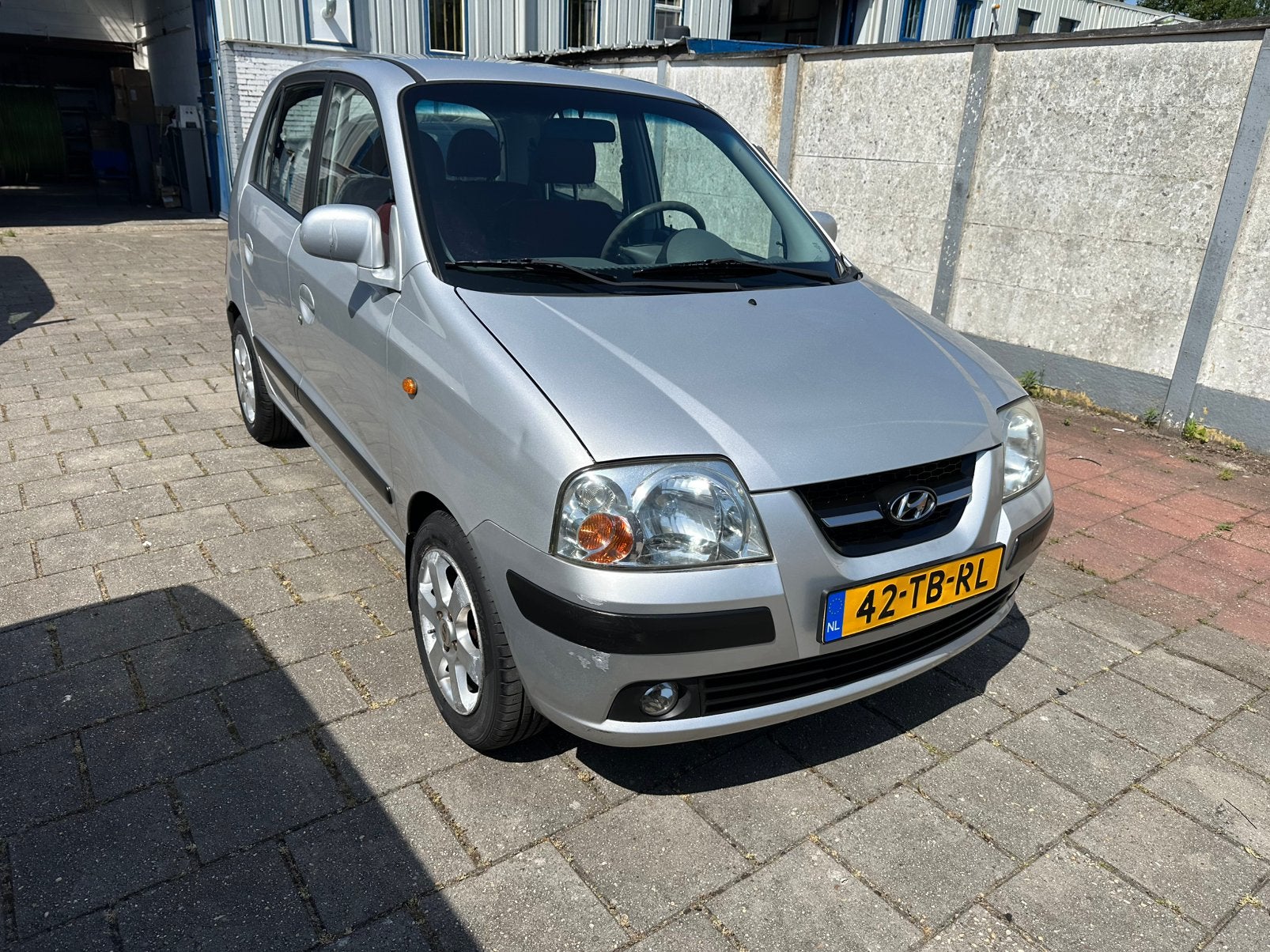 Hyundai Atos 1.1 2006 Grijs, Auto's, Voorwielaandrijving, 31 €/maand, 4 cilinders, Origineel Nederlands