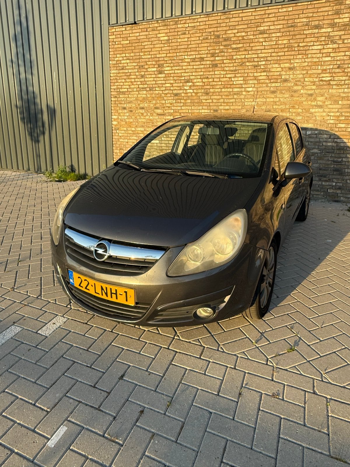 Opel Corsa 1.2 Twinport 85pk 5d 2010 Grijs, Voorwielaandrijving, Euro 5, Stof, 1229 cc