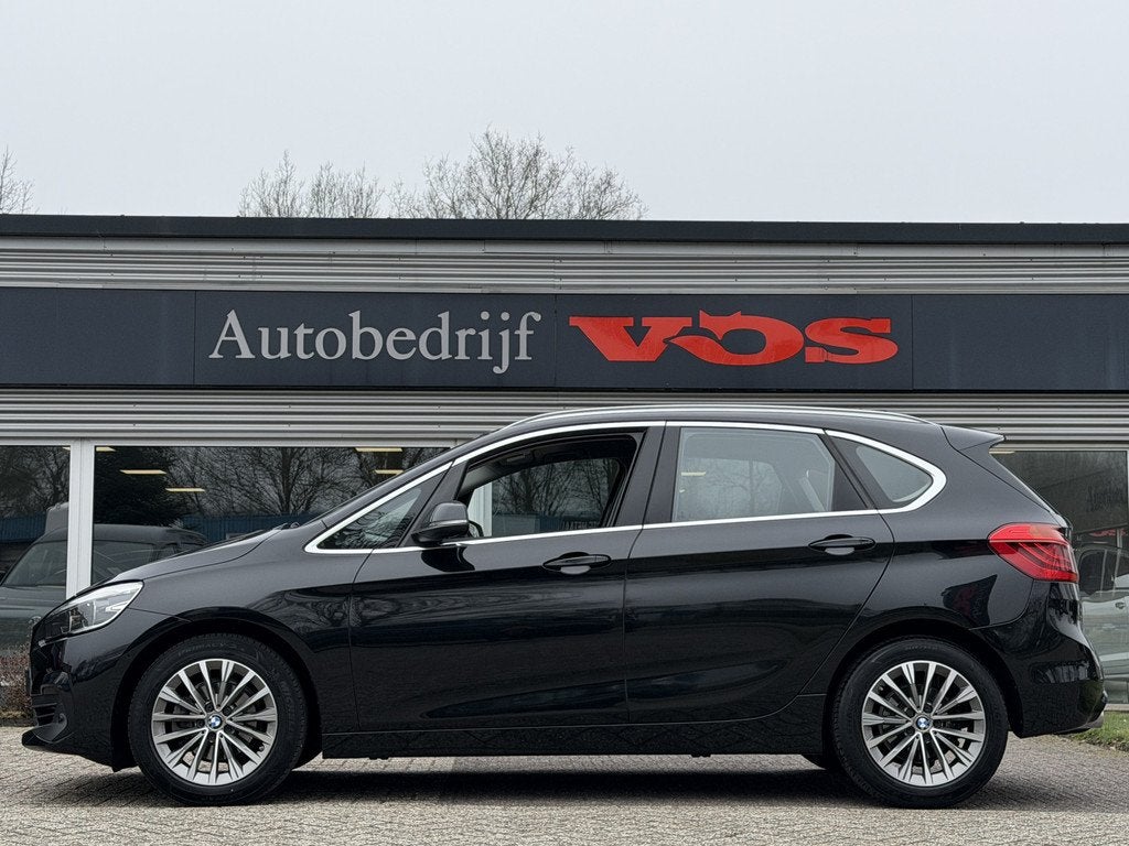 BMW 2 Serie Active Tourer 218i | Automaat | Cruise | Trekhaa, Auto's, BMW, Stof, Gebruikt, Met garantie (alle), Zwart