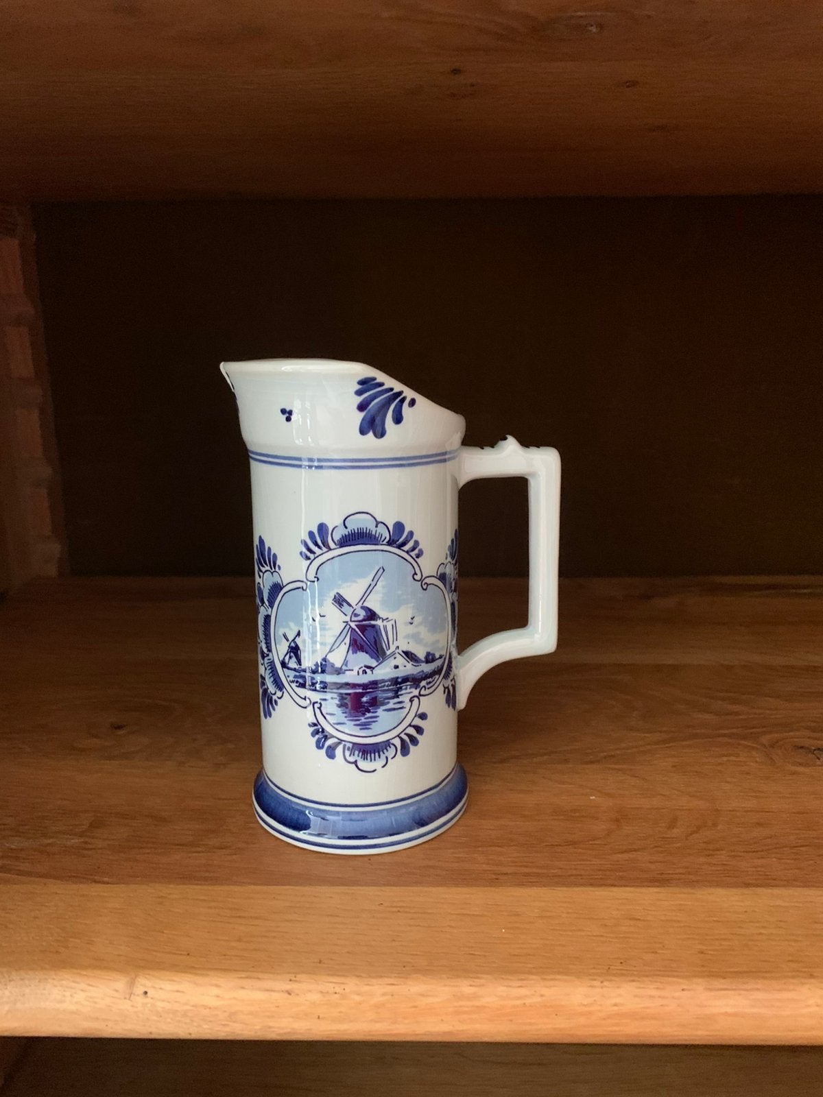 Delfts blauwe schenkkan, Ophalen