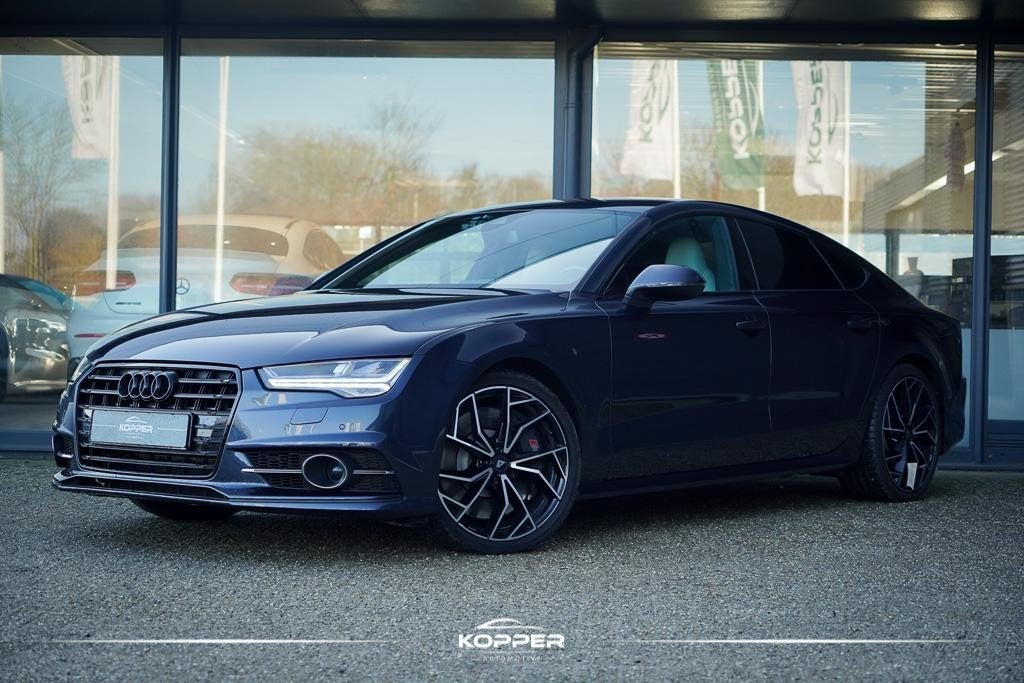 Audi A7 Sportback 4.0 TFSI S7 quattro Pro Line Plus / Luchtv, Auto's, Audi, Gebruikt, Regensensor, 4 stoelen, Zwart