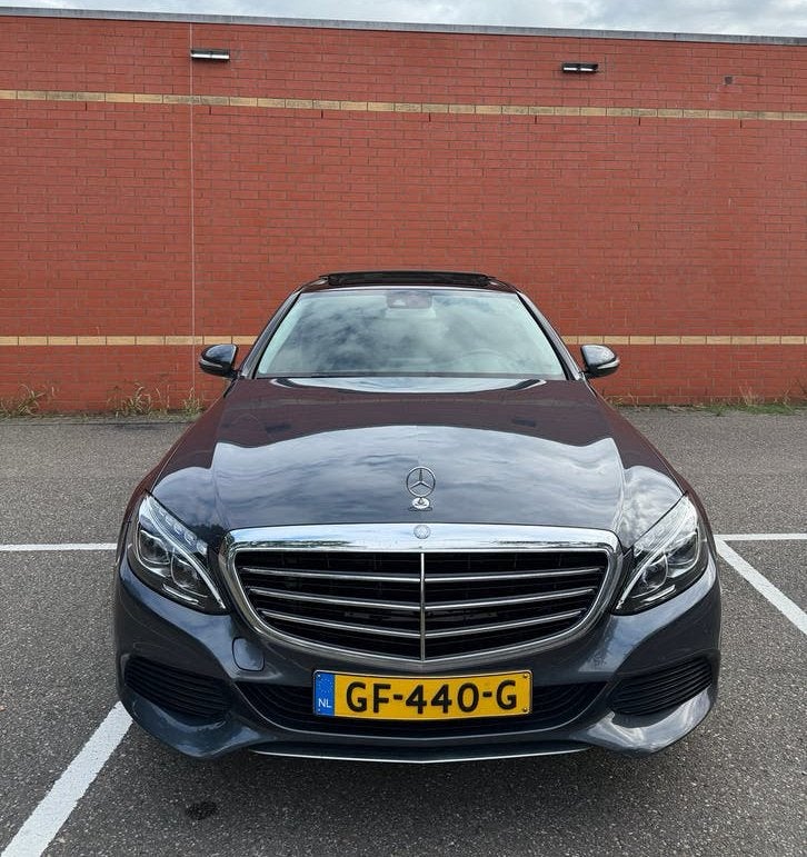 Mercedes-Benz C180 Exclusive Ambition | Panoramadak | LED|, Automaat, 1800 kg, Particulier, 710 kg