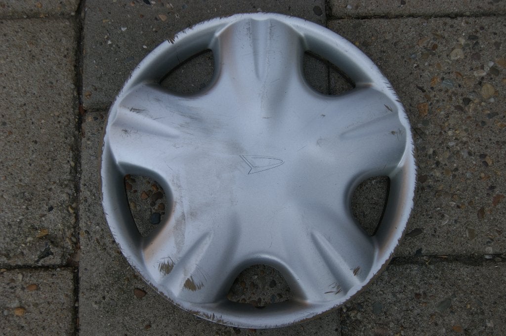 1 losse originele wieldop Daihatsu Cuore 13 inch, Ophalen of Verzenden, Gebruikt