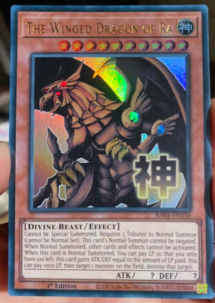 Yu-Gi-Oh! The Winged Dragon of Ra RA05 1st Edition !, Ophalen of Verzenden, Zo goed als nieuw, Losse kaart, Foil