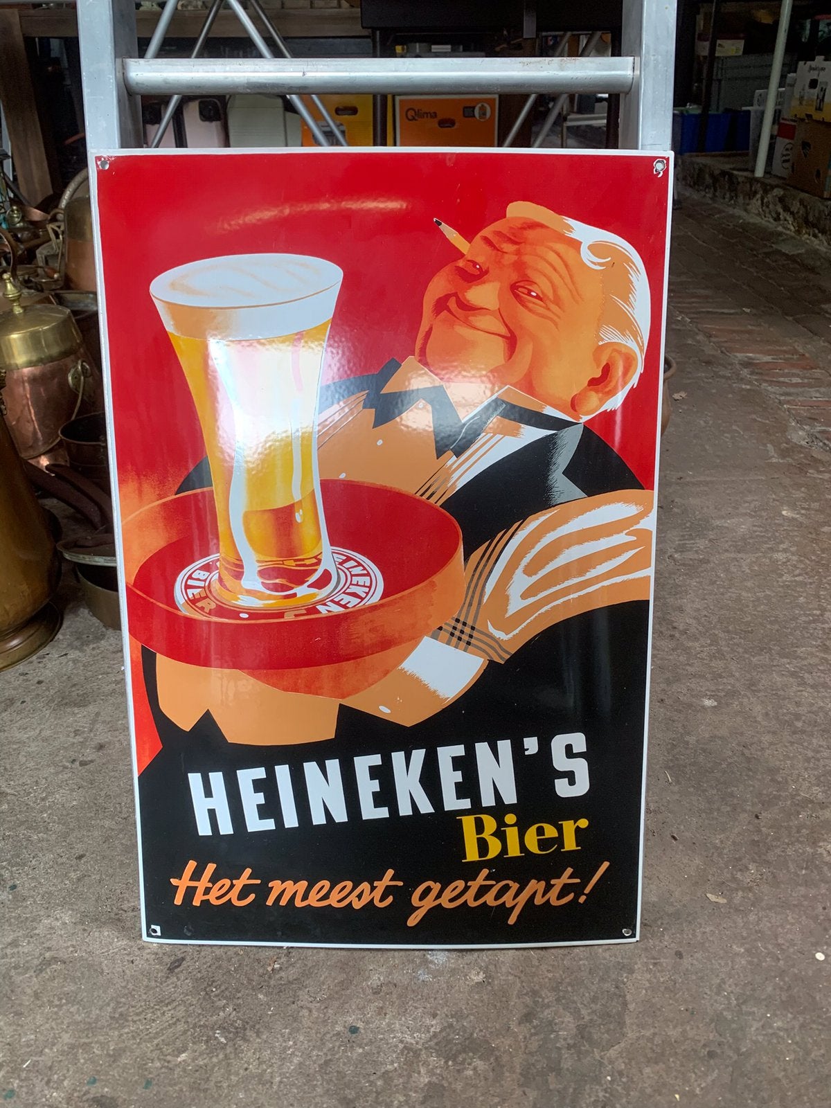 Emaille Heineken bord, Ophalen