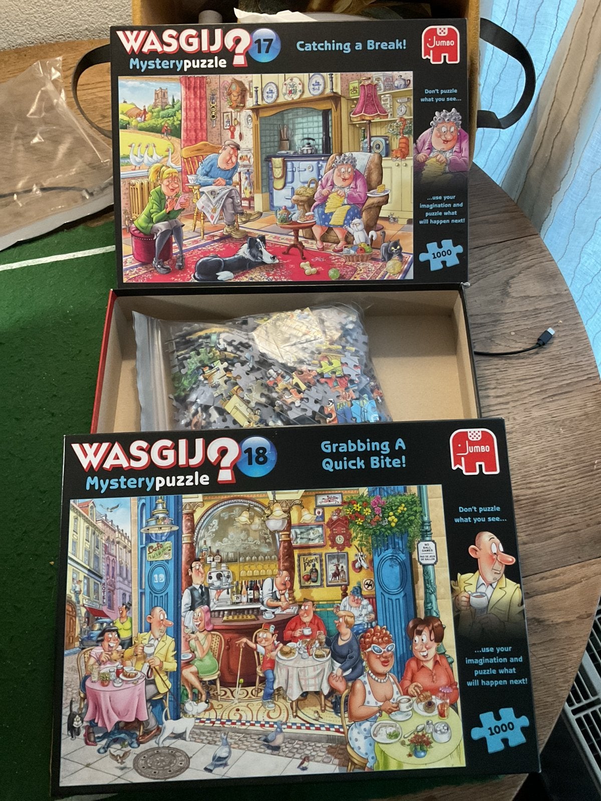 2x Wasgij Mystery Puzzel 1000 stukjes - Z.G.A.N., Ophalen, 500 t/m 1500 stukjes, Zo goed als nieuw, Legpuzzel