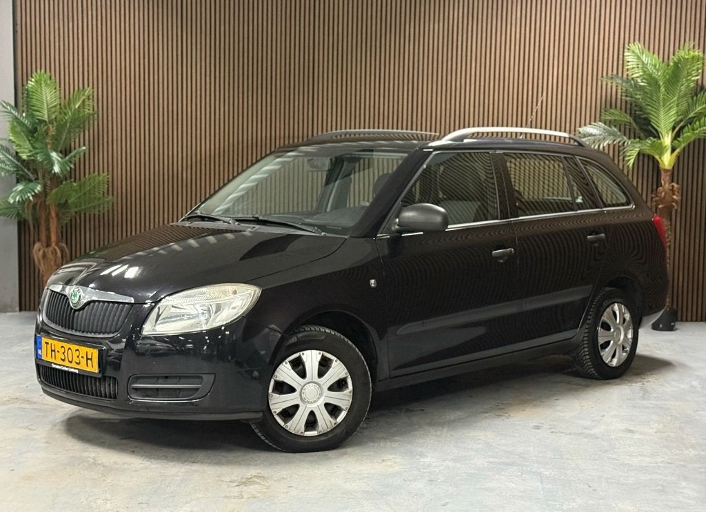Skoda Fabia Combi 1.2-12V Comfort (bj 2009), Auto's, Voorwielaandrijving, 450 kg, 1045 kg, 1198 cc