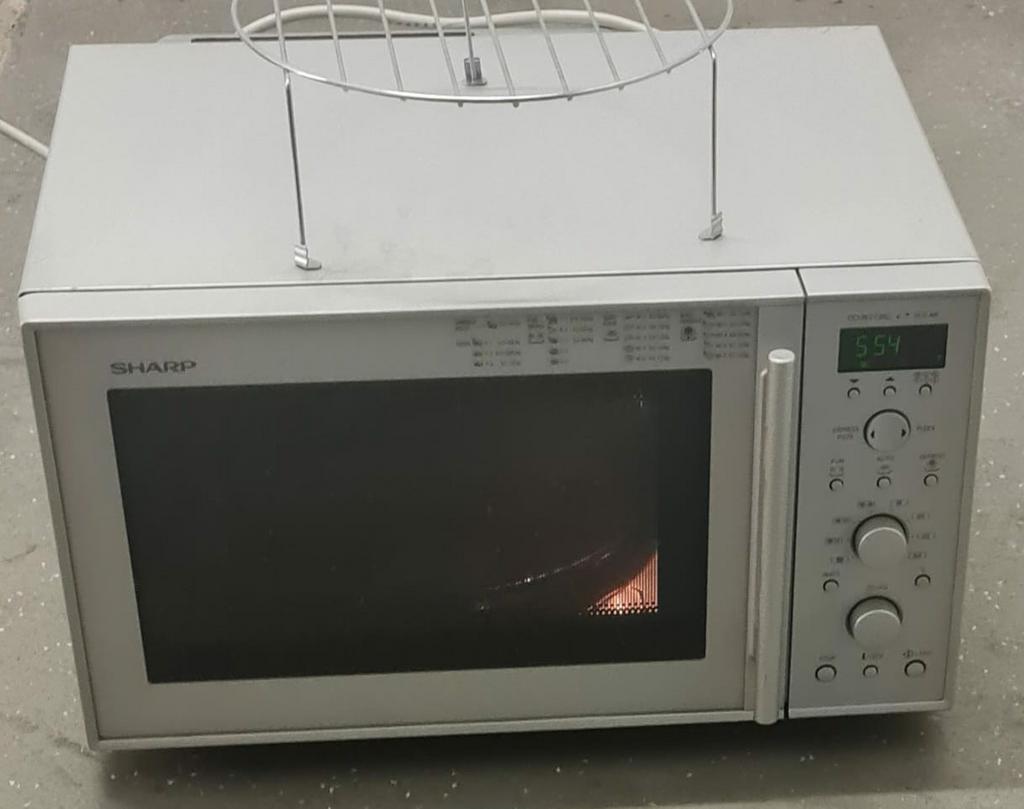 Goede werkende magnetron van het merk SHARP Met heteluchtove, Ophalen of Verzenden, Zo goed als nieuw