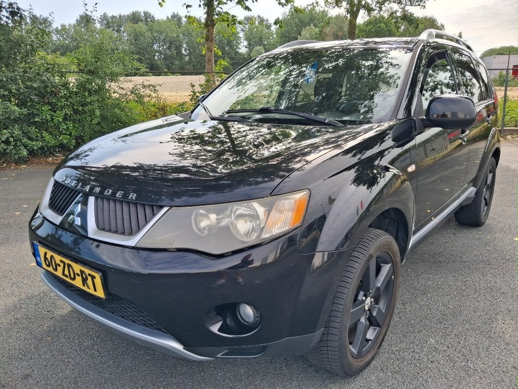 Mitsubishi Outlander 2.4 MPI 2WD 2008 Zwart NIEUW MOD, Auto's, Mitsubishi, Voorwielaandrijving, Euro 5, Stof, Outlander