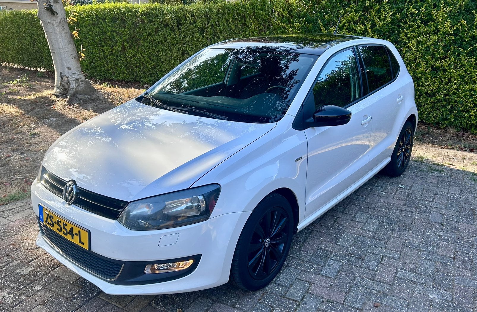 Volkswagen Polo 1.2 TSI|Panoramadak|CarPlay|Stoelverwarming, Voorwielaandrijving, 40 €/maand, Zwart, 4 cilinders