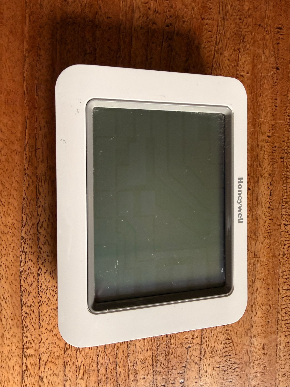Twee Honeywell thermostaten, werkend gedemonteerd