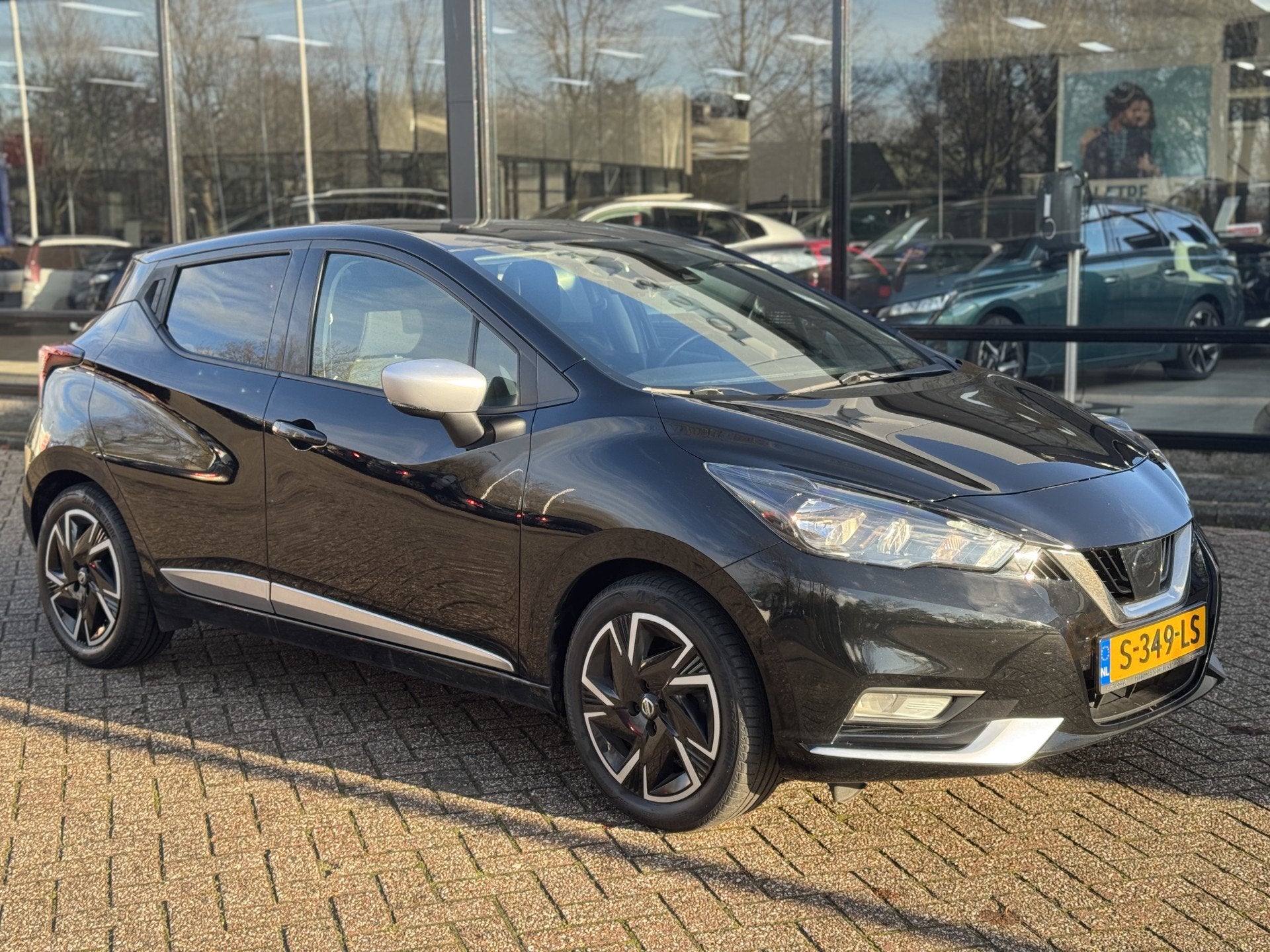 Nissan Micra 1.0 IG-T N-Design Navigatie|Trekhaak (bj 2023), Auto's, Voorwielaandrijving, Dealer onderhouden, Stof, Zwart