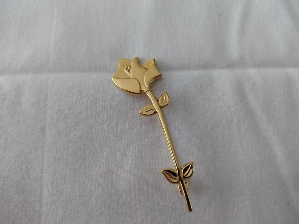 Lancome brooche, Ophalen of Verzenden, Gebruikt, Merk, Speldje of Pin