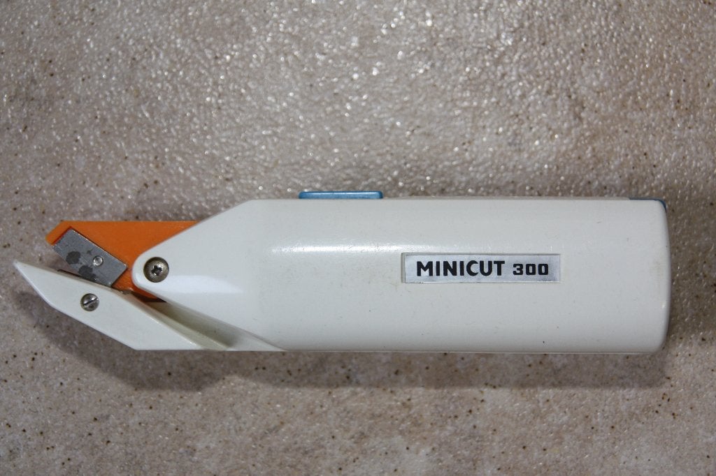 Vintage elektrische draadloze schaar Minicut 300, Ophalen of Verzenden, Zo goed als nieuw