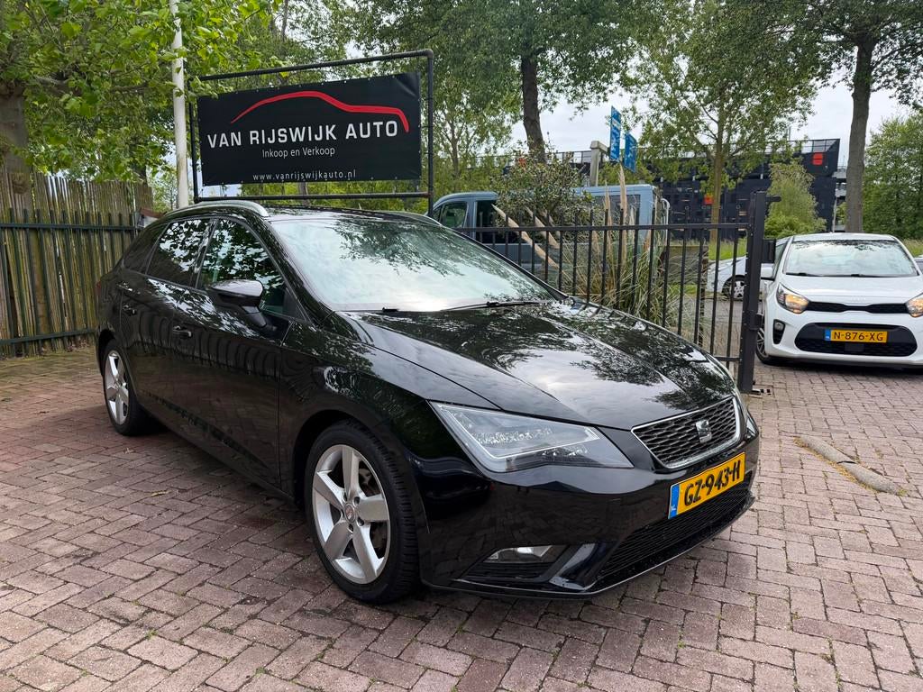 Seat Leon ST 1.6 TDI Style Business Leder Led Aut Clima, Auto's, Seat, Euro 5, Gebruikt, 4 cilinders, Leon