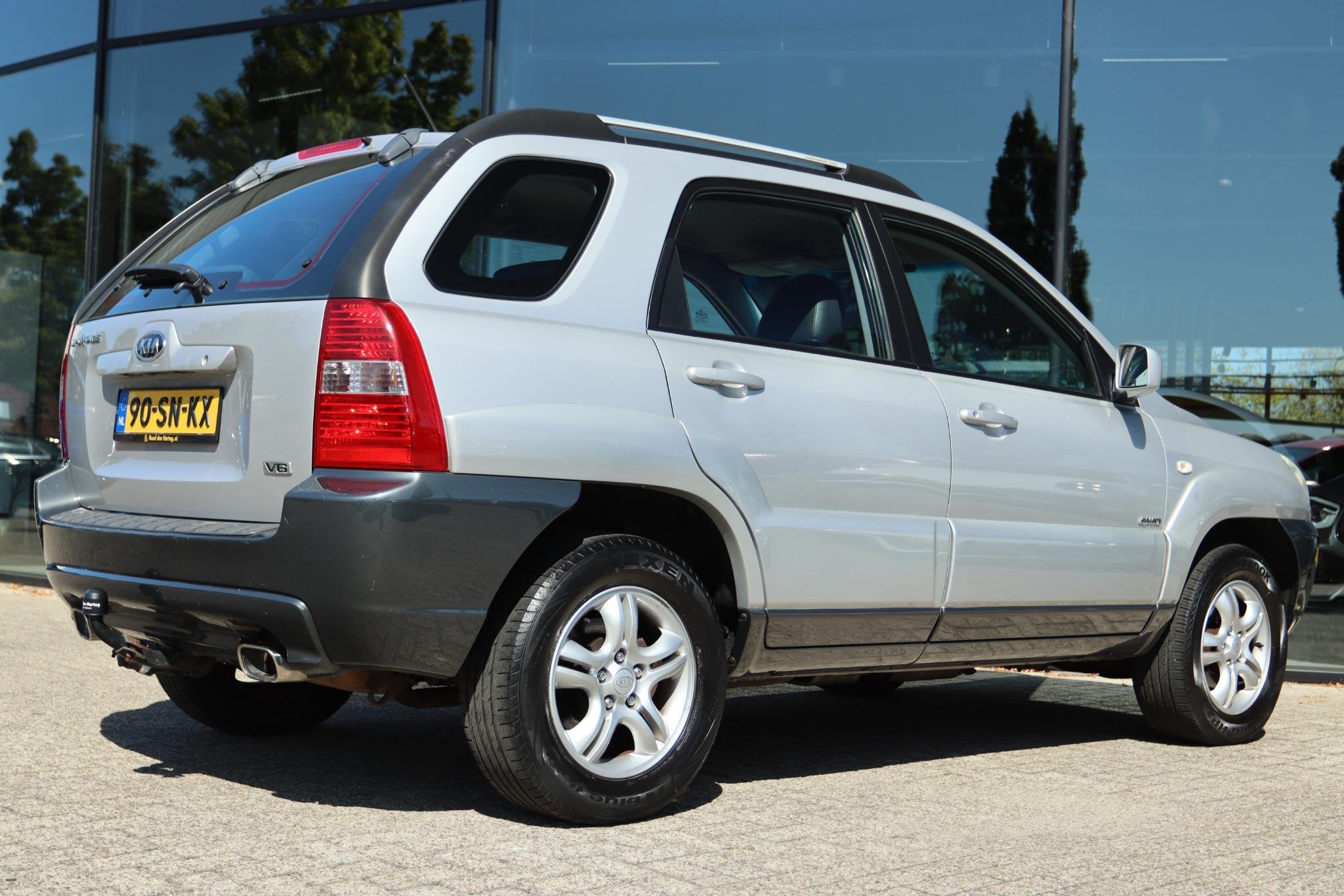 KIA SPORTAGE 2.7 V6 ADVENTURE 4WD | CRUISE | CLIMATE | TREKH, Auto's, Automaat, Stof, Gebruikt, 2656 cc