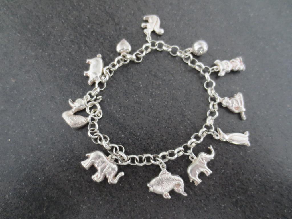 Sieraden Zilveren Bedel-armband- Met 11 zilveren bedels izgs, Antiek en Kunst, Ophalen of Verzenden, Zilver