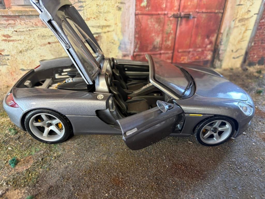 Porsche carrera gt Maisto, Ophalen of Verzenden, Zo goed als nieuw, Maisto