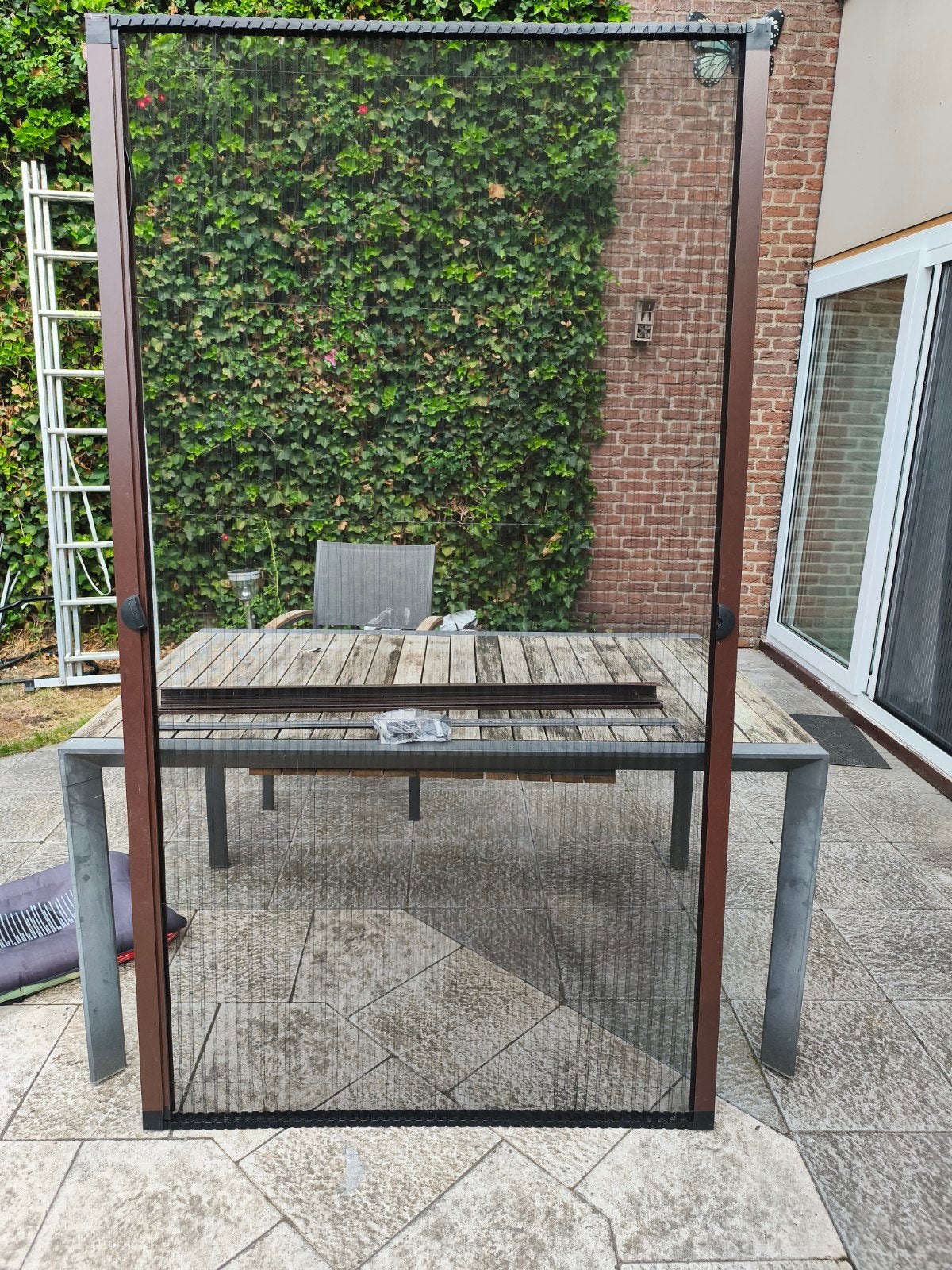 Unilux Plissé Hordeur Bruin 110x203cm (bxh) uit 2020, Doe-het-zelf en Verbouw, Deuren en Horren, Hordeur, Zo goed als nieuw, 200 tot 215 cm