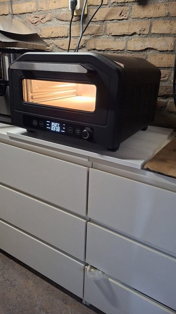 pizza oven, Type: TY-P01L | 1700 watt.  incl. pizza schep., Ophalen, Zo goed als nieuw