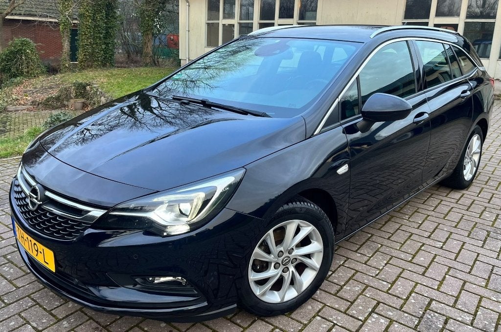 Opel Astra 1.0 Turbo 77KW Sports Tourer 2018 Blauw, Auto's, Opel, Dealer onderhouden, 1178 kg, Blauw, Origineel Nederlands