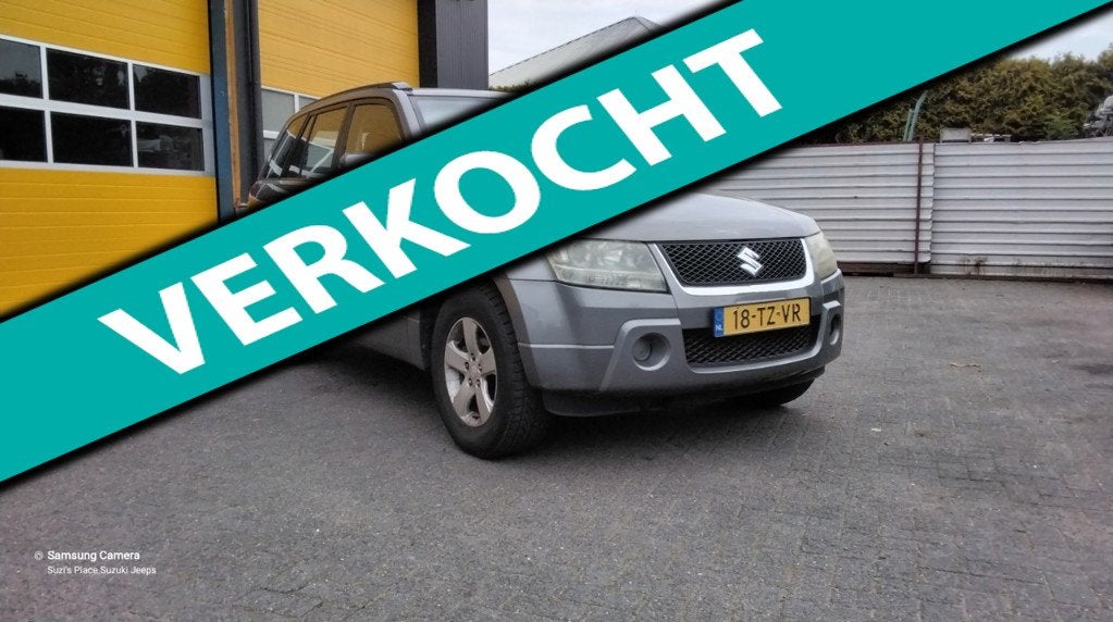 Suzuki Grand Vitara 2.0-16V JLX, Auto's, Suzuki, Stof, Zwart, 4 cilinders, 1850 kg