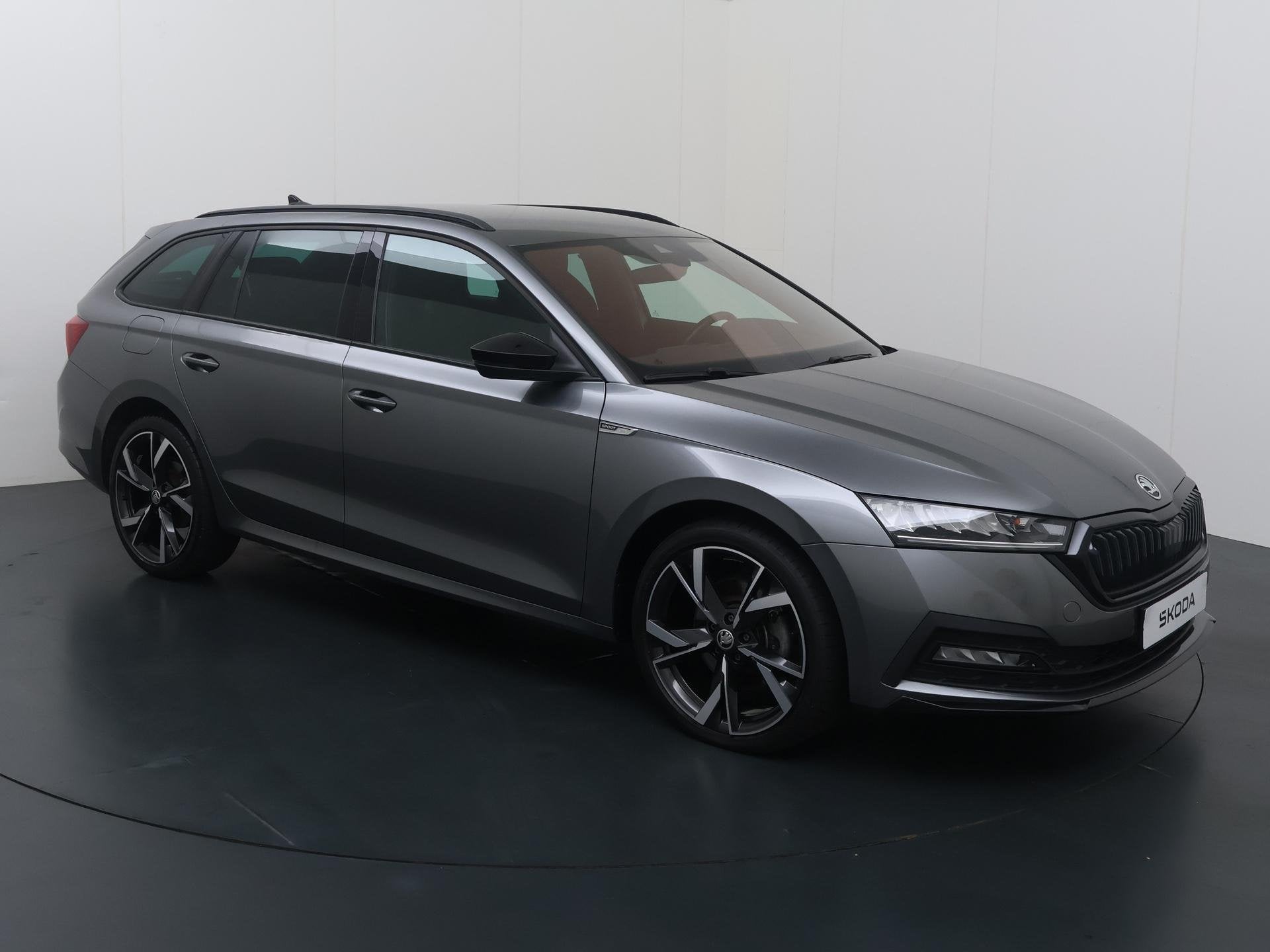 Skoda Octavia Combi 1.4 TSI iV PHEV Sportline Business | 204, Auto's, 12 maanden, Stof, Gebruikt, 4 cilinders