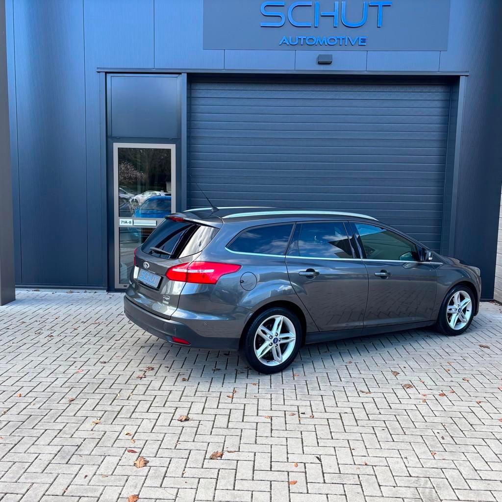 Ford Focus Wagon 125pk Titanium CLIMA | NAVI | 17INCH | LED, Auto's, Gebruikt, Zwart, Origineel Nederlands, 3 cilinders
