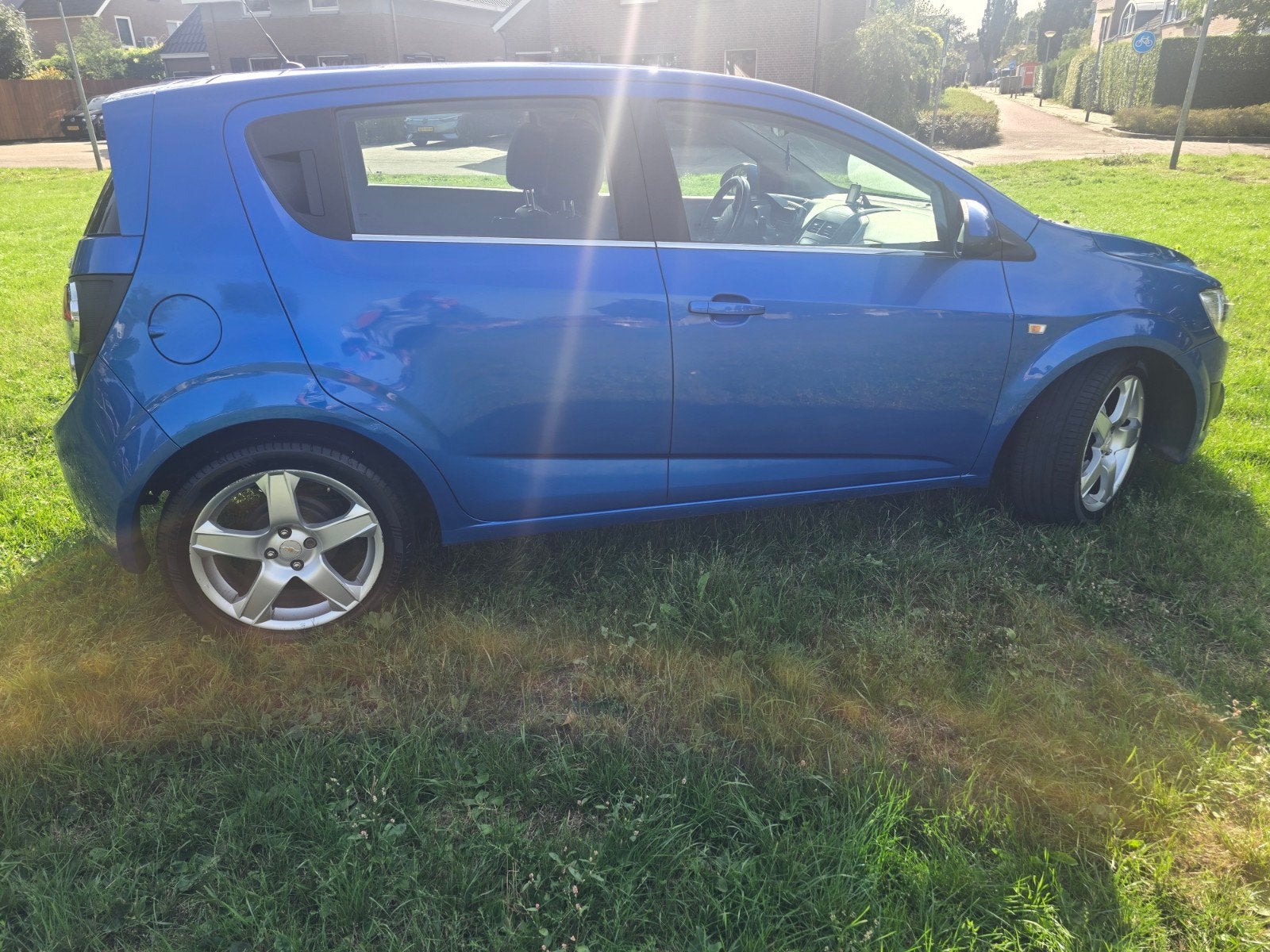 Chevrolet Aveo 1.4 LTZ 5D 2011 lees beschrijving goed!, Auto's, Voorwielaandrijving, Euro 5, 4 cilinders, Blauw