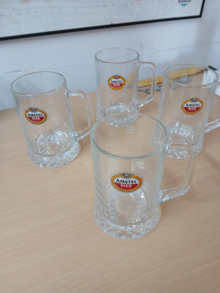 4 Amstel Bier pullen - 0.5L - Zo goed als nieuw, Huis en Inrichting, Ophalen of Verzenden, Zo goed als nieuw, Overige merken, Glas