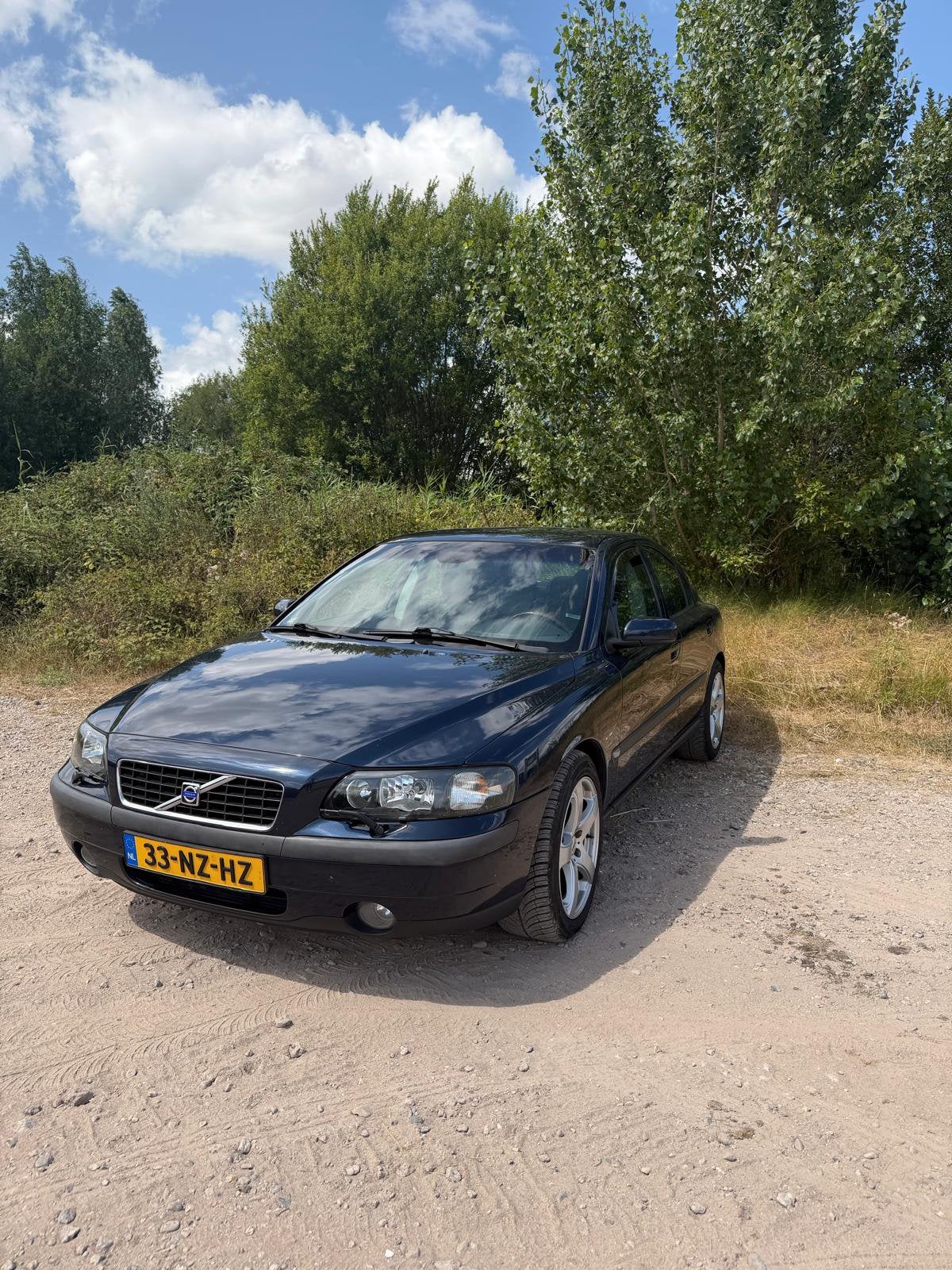 Volvo S60 2.5 T 210pk Winterpaket, Origineel nederlandse, Auto's, Voorwielaandrijving, Automatische klimaatregeling, Zwart, Blauw
